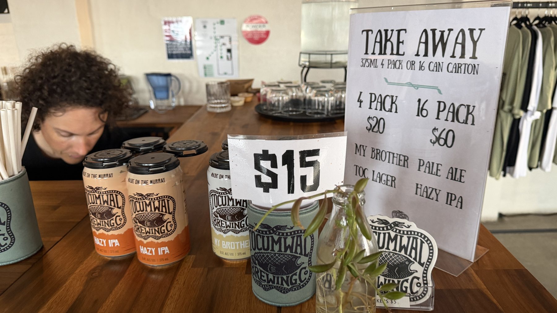 Takeaway beer and brewery merchandise on the timber bar
