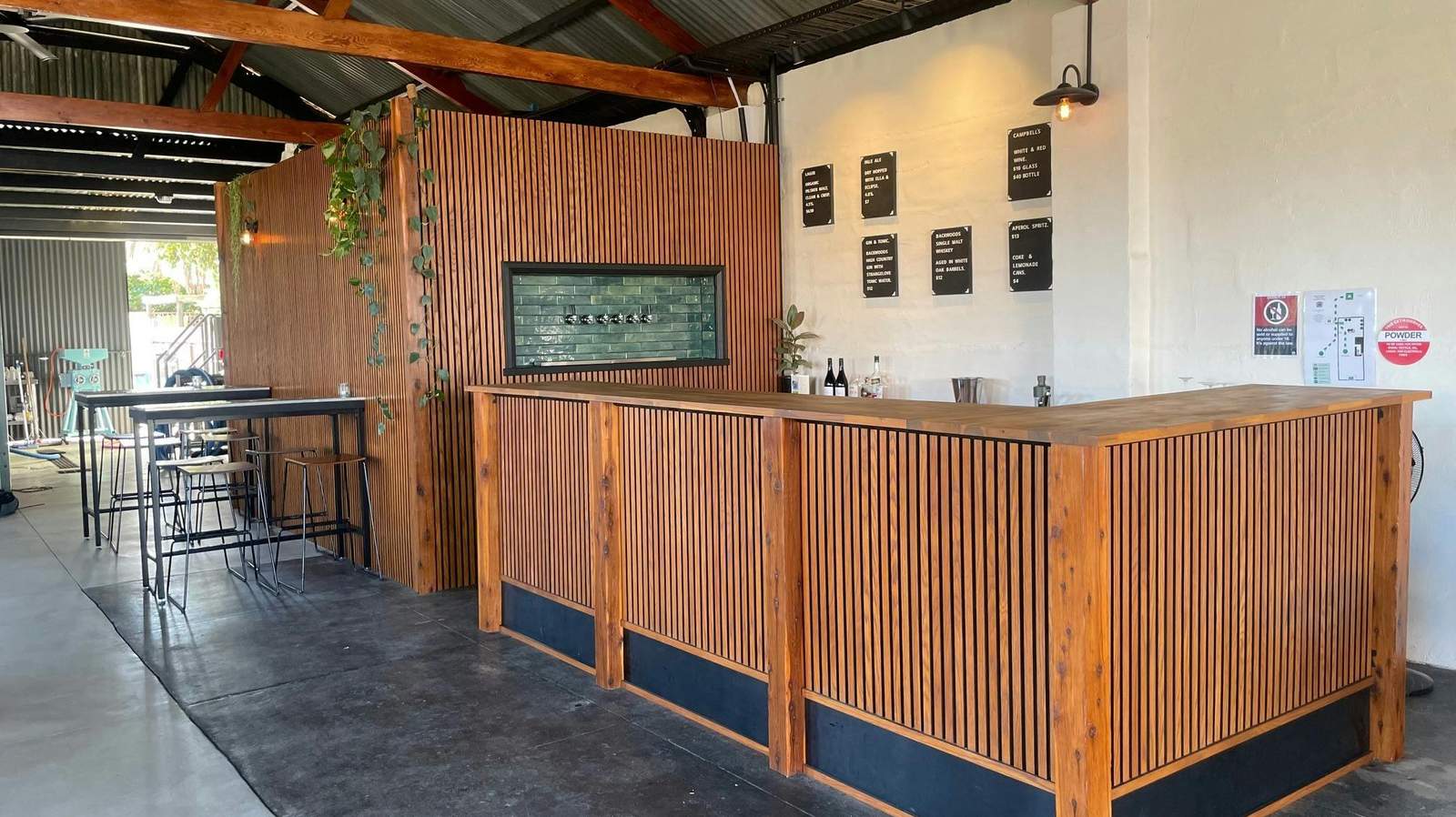 Timber bar and beer taps inside the brewery